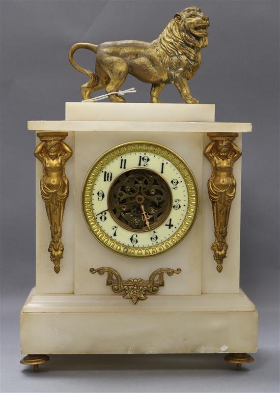 An alabaster mantel clock with gilt metal lion surmount height 37cm